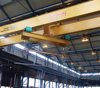 Rotating girder overhead crane