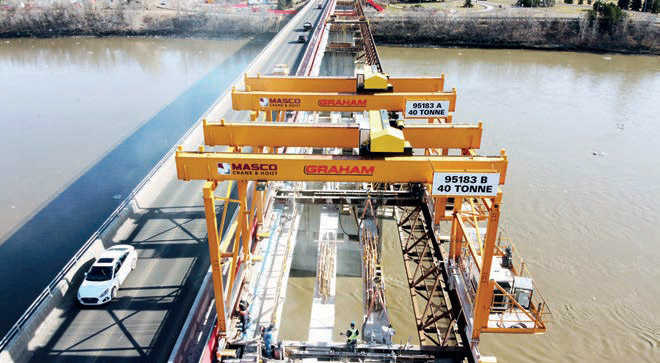 Graham Construction & Engineering in Canada used two gantry cranes to reconstruct a bridge (
