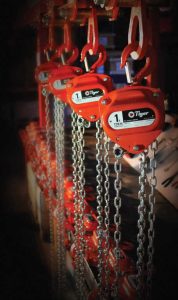A row of Tiger TCB hoists, and Tiger’s deep-profile chain block and ‘EZ Check’ hook.