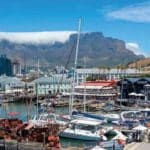 The waterfront is a popular Cape Town attraction, with visitor flow there accelerating as tourism recovers after the impact of the Covid-19 pandemic. (© gg-foto/Shutterstock.com)