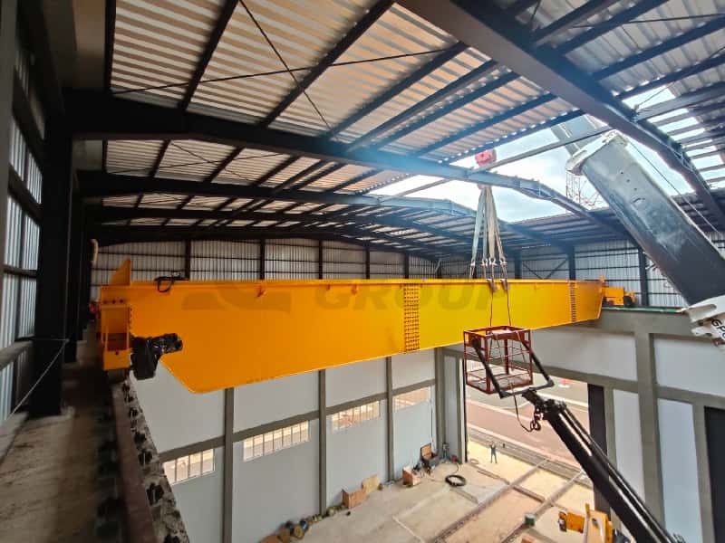 The main beam is being hoisted